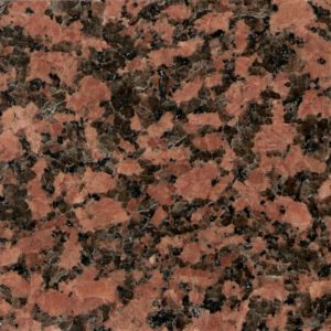 Rusty red granite with black speckles