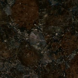Rusty red granite with black speckles