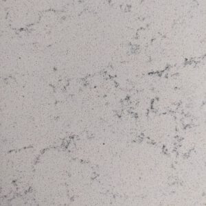 Dusty mauve quartz with scattered specks