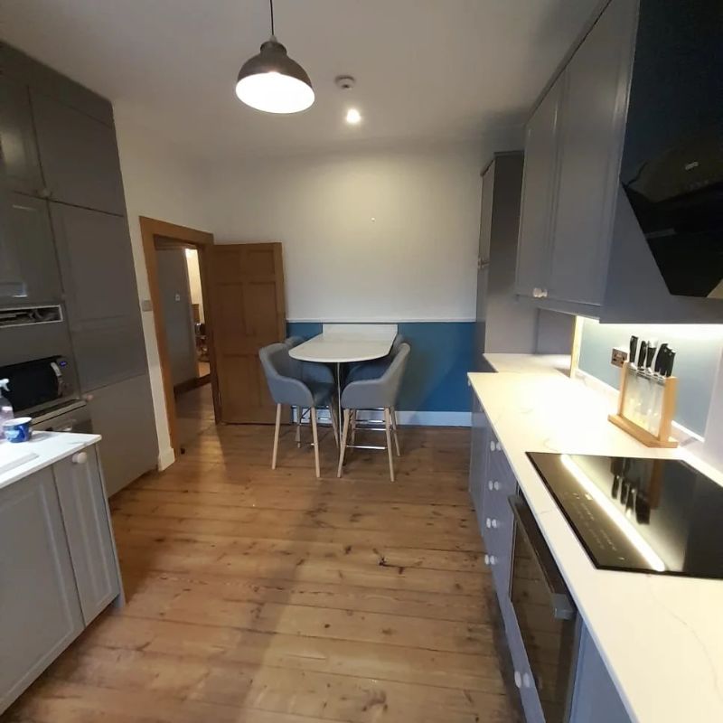 a kitchen and a stone worktop